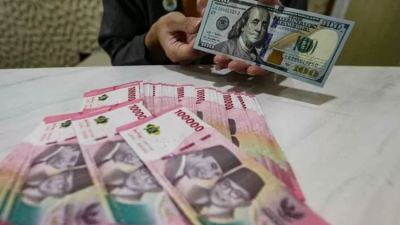Rupiah Kian Tertekan, Ditutup Rp16.758 per Dolar AS: Potensi Tembus Rp17.000 pada Oktober 2025